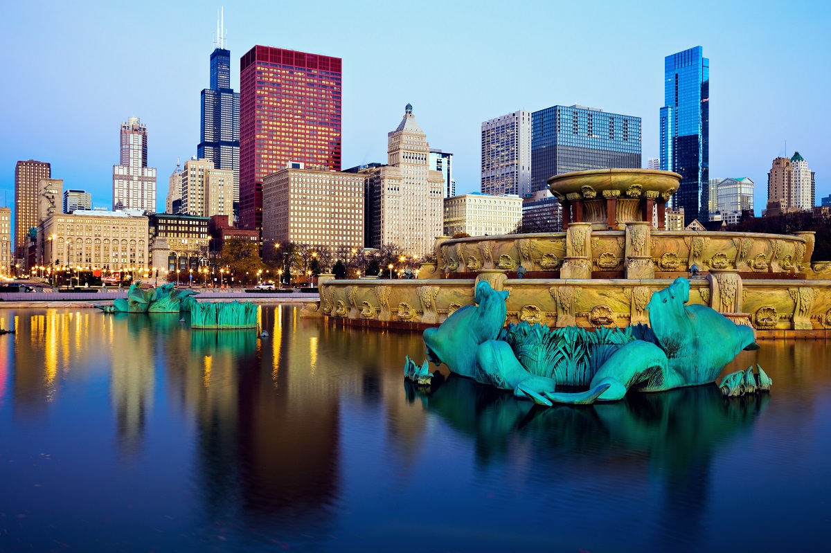 Chicago skyline reflected in Buckingham Fountain. Chicago, Illinois, USA.